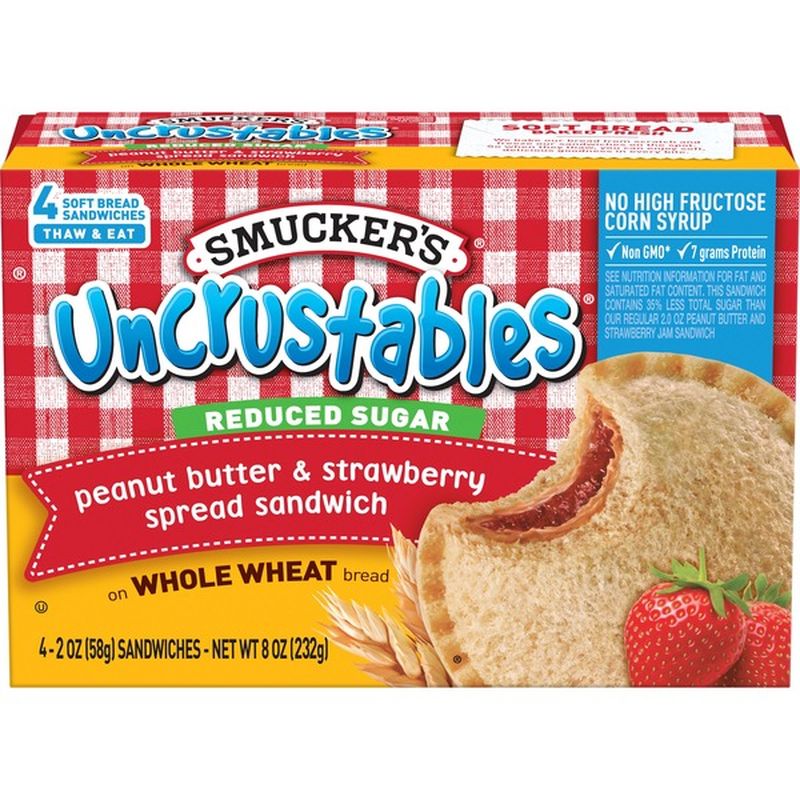 Smucker S Uncrustables Reduced Sugar Peanut Butter Strawberry Spread Sandwich On Whole Wheat Bread 2 Oz Instacart